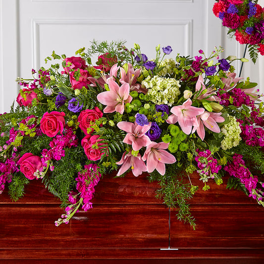 Radiant Tribute Casket Spray – BERMAN'S FLOWERS, Kingsburg CA
