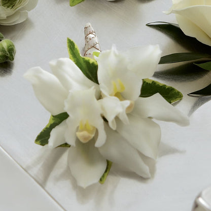 White Mini Cymbidium Boutonniere – BERMAN'S FLOWERS, Kingsburg CA